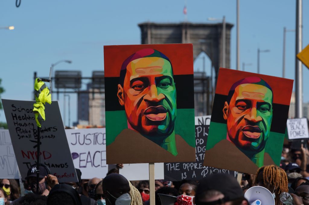 Protesters march across the Brooklyn Bridge over the death of George Floyd by Minneapolis Police during a Juneteenth rally in New York on June 19, 2020. 