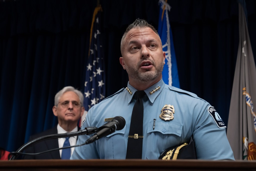 Attorney General Merrick Garland listened as Minneapolis Police Chief Brian O'Hara spoke about how his department will comply with the DOJ investigation at a press conference. 
