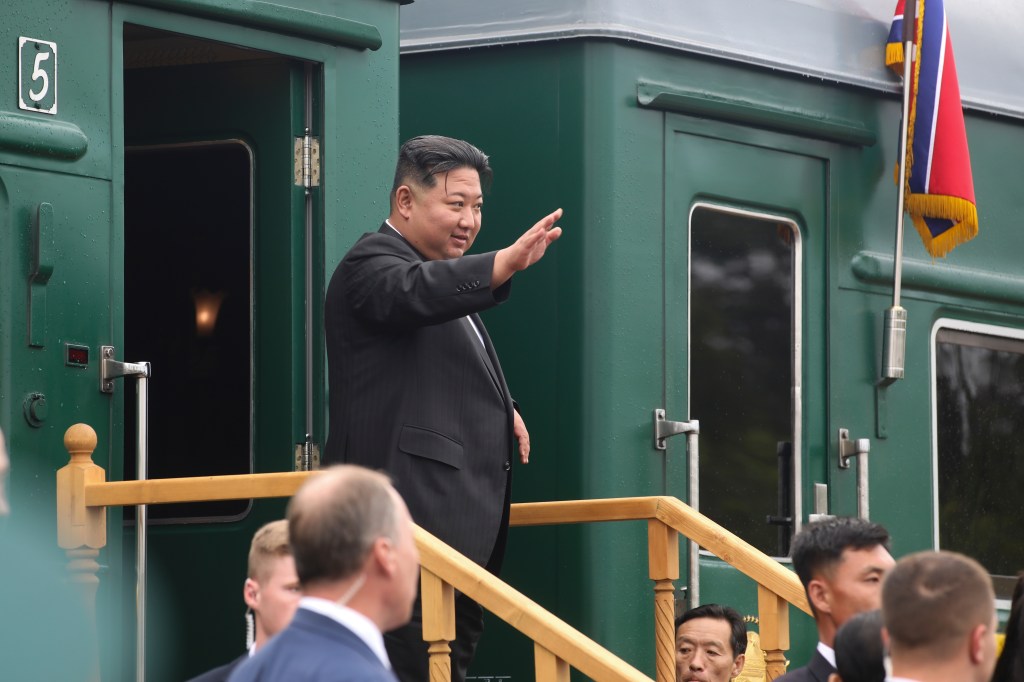  Kim Jong Un waves as he boards his train prior to leaving Artyom, near Vladivostok, Russian Far East on Sunday, Sept. 17, 2023. 